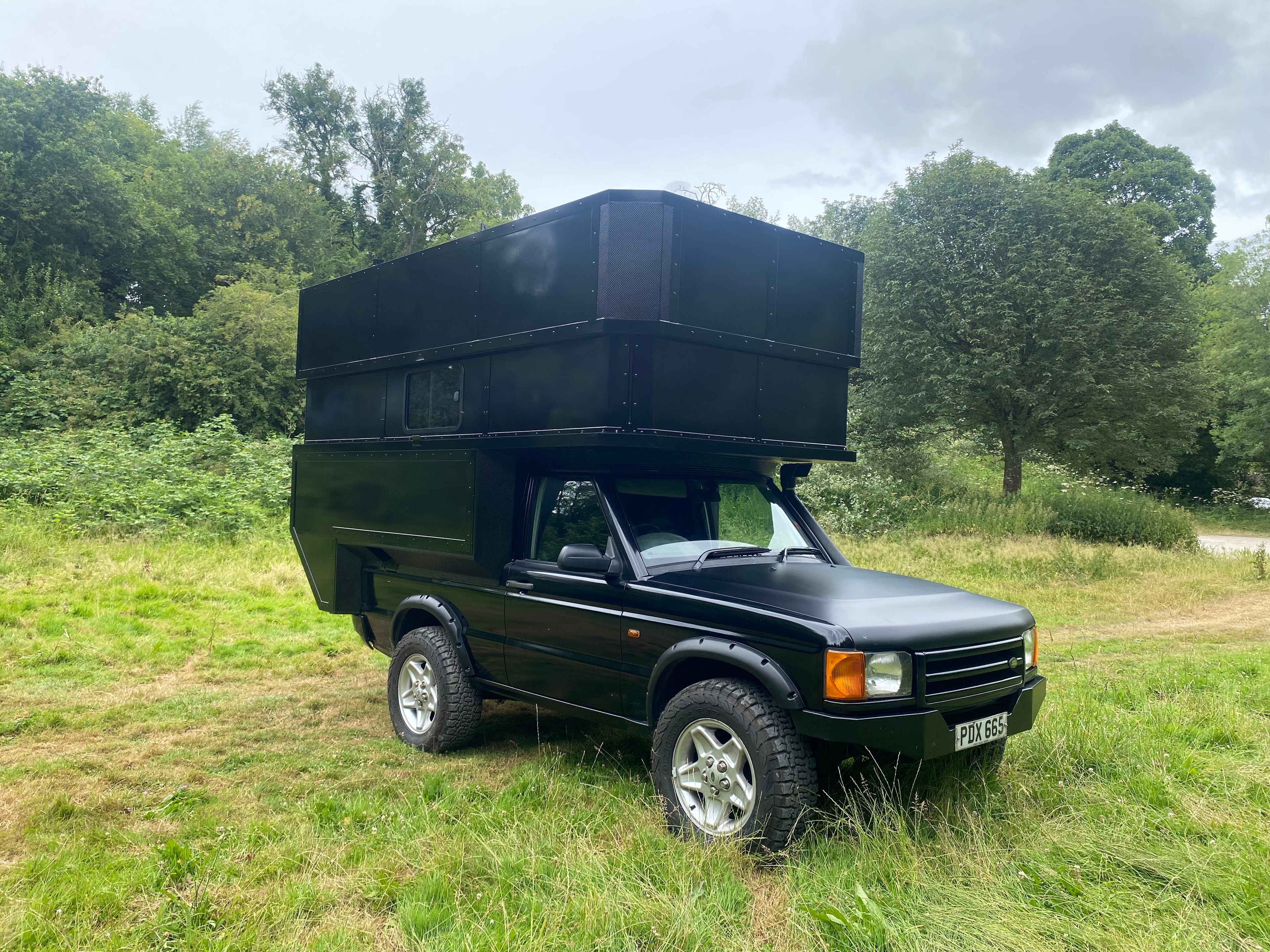 The Highlander — front view, box unit raised
