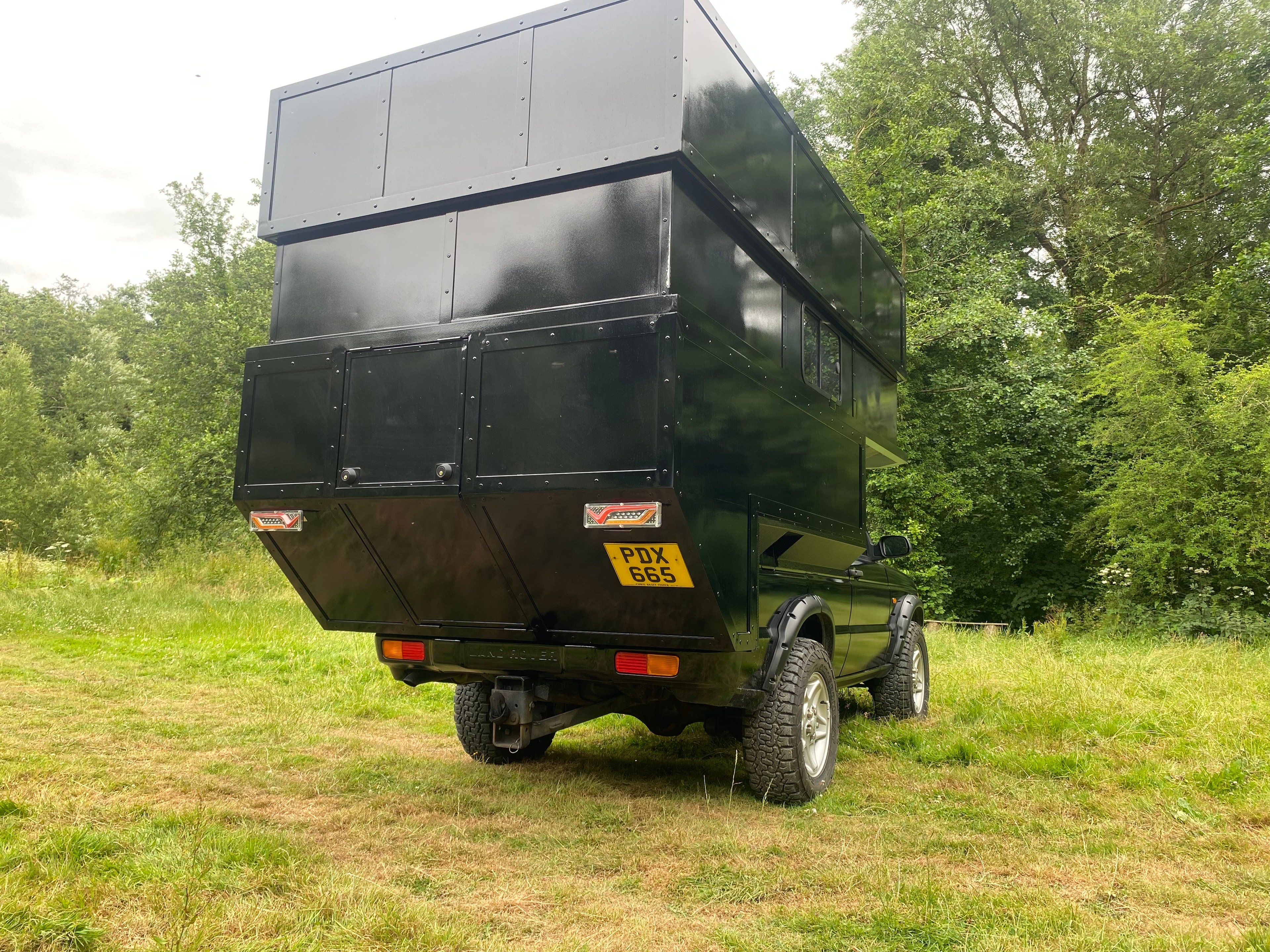 The Highlander — rear three-quarter view