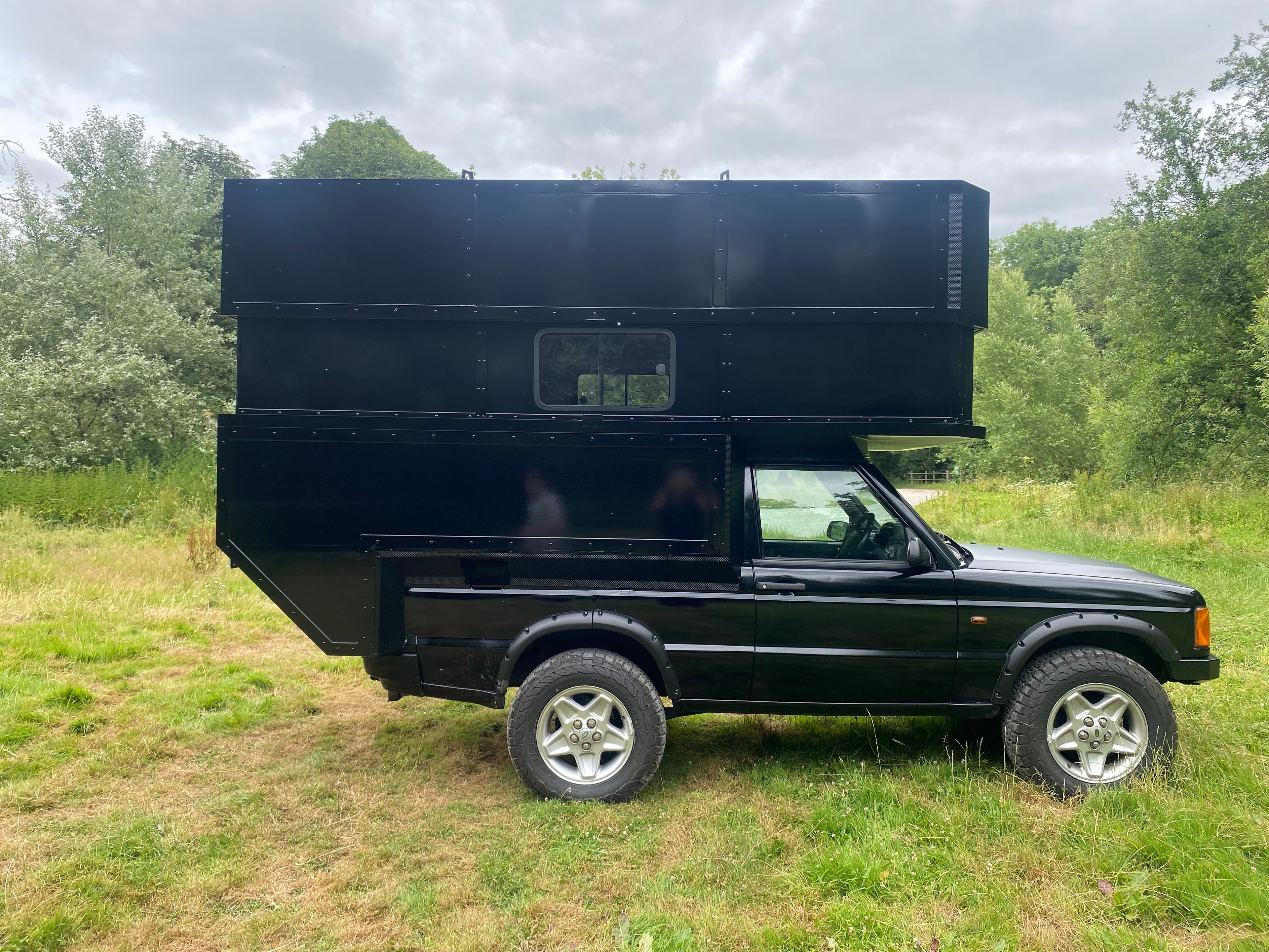 The Highlander — side profile, open field